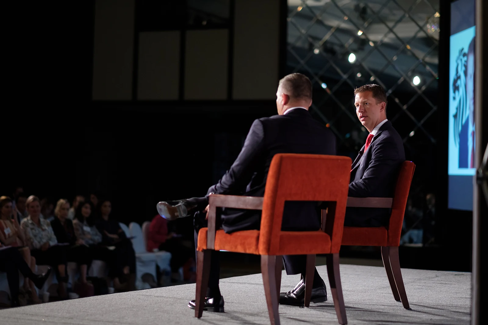 Alexander Erber and JT Foxx in conversation before an audience.