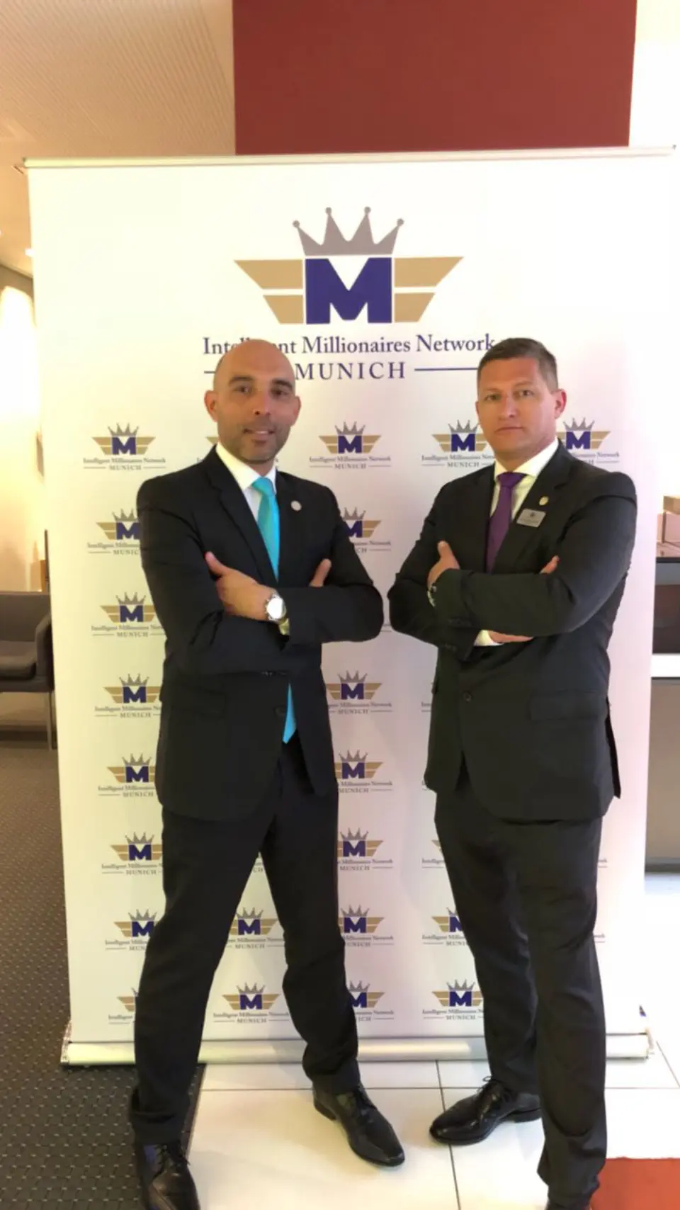 Alexander Erber with another participant at an event in Munich.