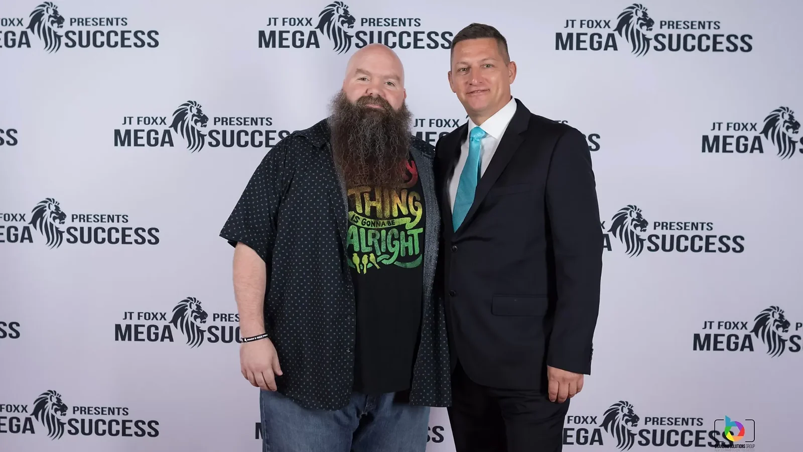 Alexander Erber with another participant at a Mega Success event.